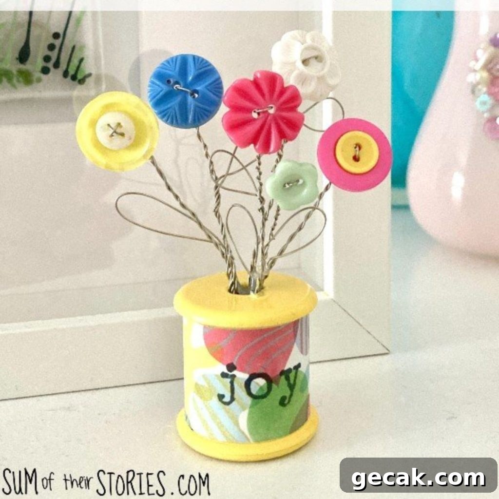 16 Creative Button Craft Ideas for Endless DIY Fun 10 Button Bouquet in a Cotton Reel with joy written on it