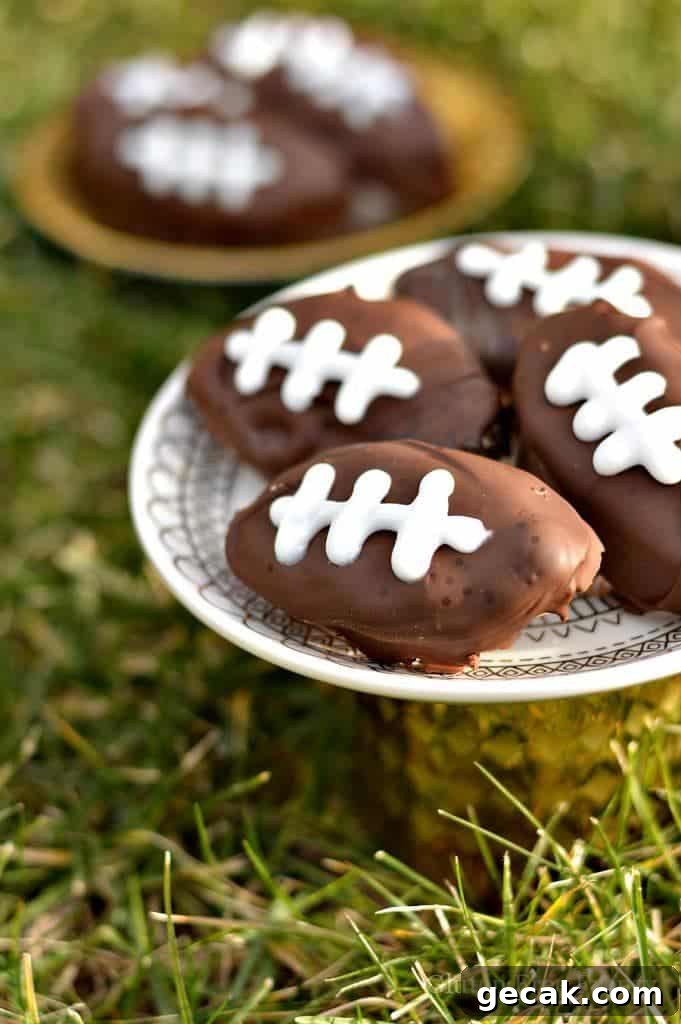 Chocolate covered gluten-free cookie dough footballs on a plate