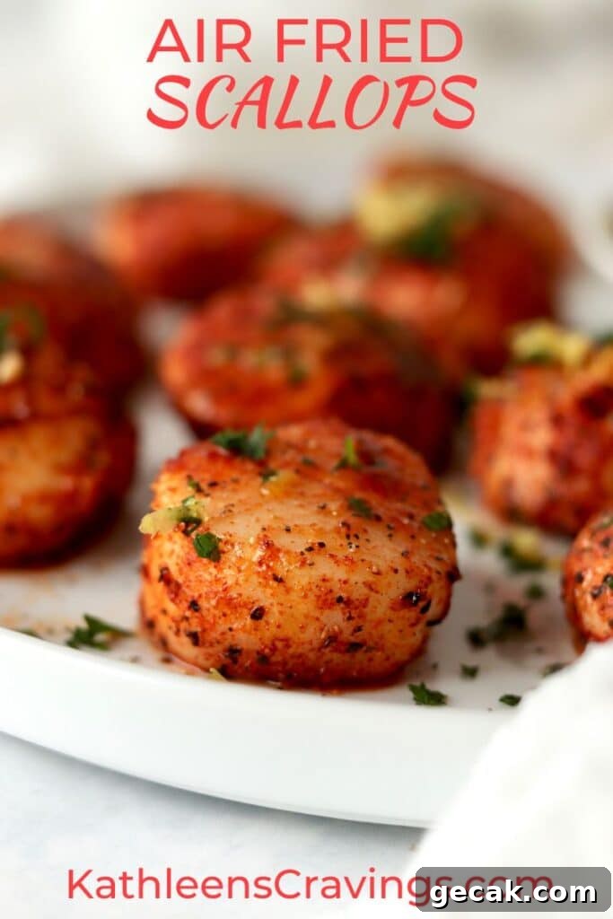 Crispy Air-Fried Scallops with Lemon Butter Sauce 2 air fried scallops on a plate