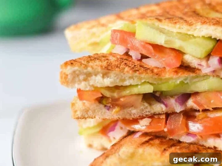 four onion tomato and cucumber sandwiches