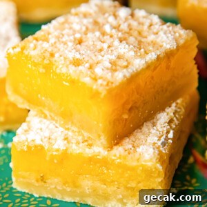 Close up shot of stacked lemon bars on a platter