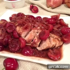 Chicken in Cherry Wine Sauce White Plate.