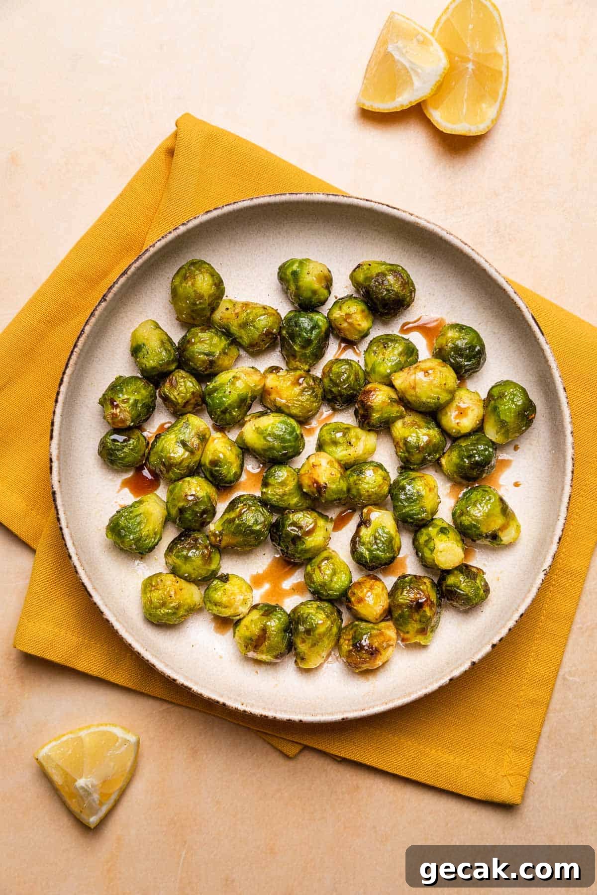Crispy Air Fryer Frozen Brussels Sprouts Recipe 5 a plate of the finished dish drizzled with balsamic glaze